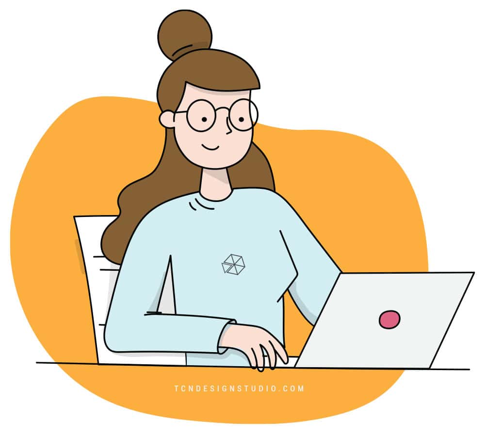 A girl writing on the computer to monetize the blog