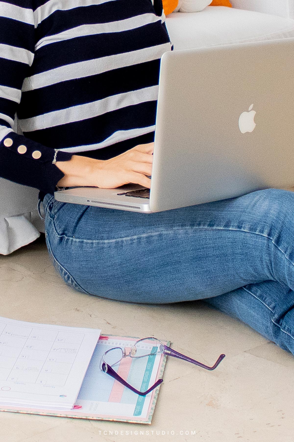 The Ultimate Guide to Writing Engaging and SEO-Friendly Tutorial and Recipe Posts. Me holding my laptop on my lap and writing